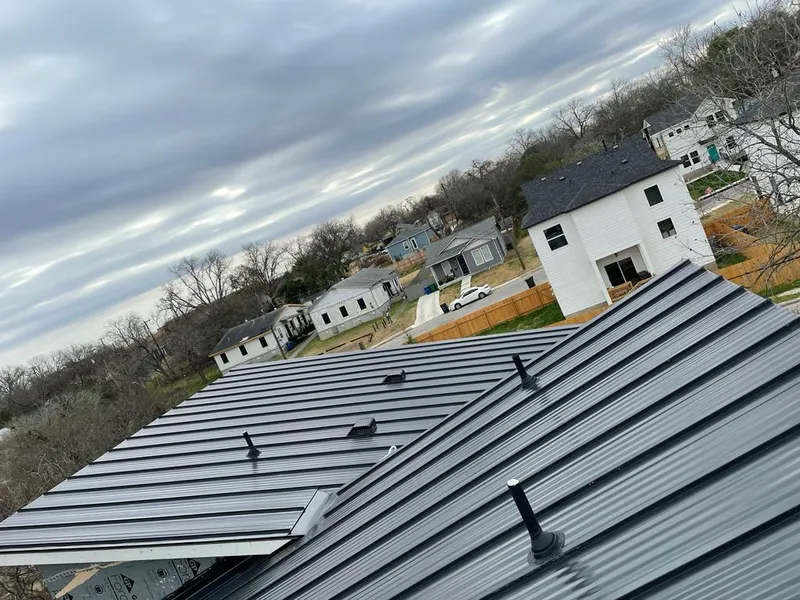 Standing seam metal roof panels with vents for Skylight Repair in St. Peter